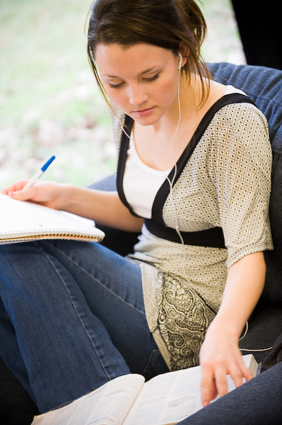 student studying headphones Photo of a female student studying wearing headphones